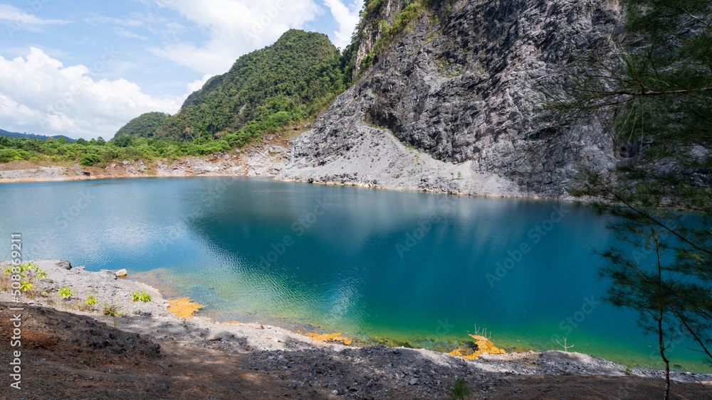 Amazing pond in tropical rainforest forest with mountain rocks peak Beautiful water surface in Phang Nga Thailand Amazing pond in tropical rainforest forest with mountain rocks peak Beautiful water surface in Phang Nga Thailand