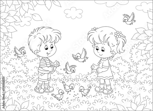 Happy little children feeding with corn a small flock of merry sparrows and titmice in a pretty summer park, black and white outline vector cartoon illustration for a coloring book page