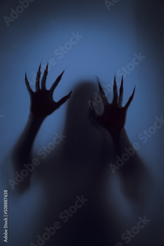 Ghost concept shadow of a women behind the matte glass blurry hand and body soft focus