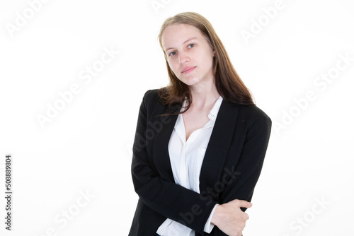 pretty business woman wearing suit standing in office isolated over white background