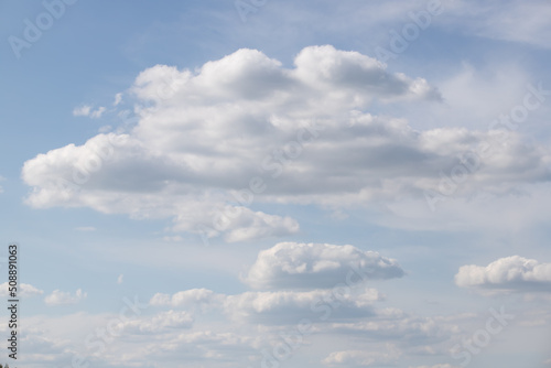 Fototapeta Naklejka Na Ścianę i Meble -  White cumulus clouds on blue sky