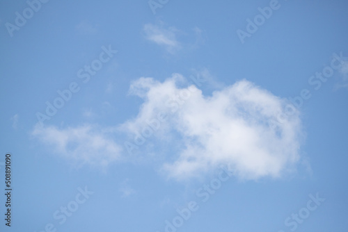 Blue sky background with white clouds. © Prikhodko