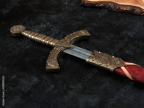 Closeup of an ancient knight's sword