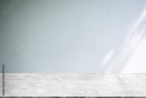 Backdrop empty gray cement wall room background with shadow. blank table studio interiors floor concrete construction. mock up display free space for and text or products presentation.