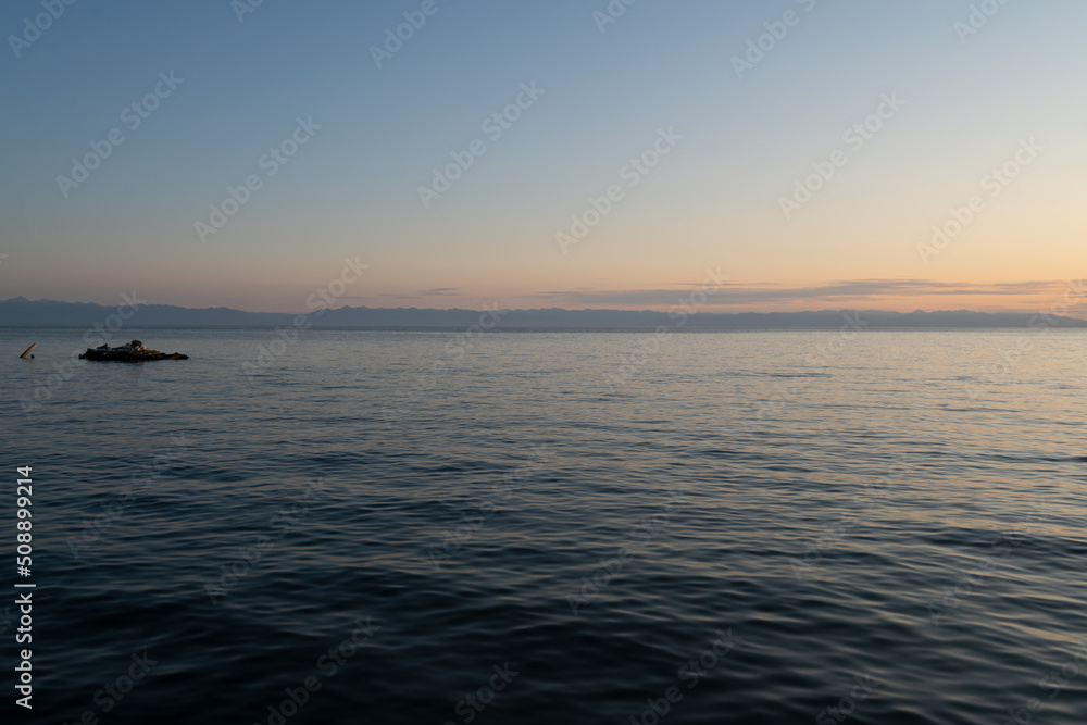 Naklejka premium Summer sunset on Lake Baikal Siberia.