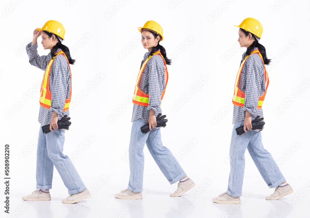 Full length 20s young Mix Race engineer contractor Woman, walking forward left right