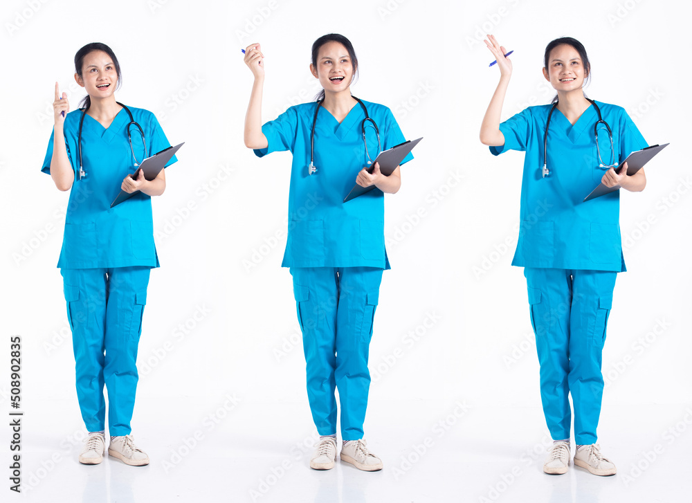 Full length 20s young Mix Race hospital nurse Woman, pointing finger Wow idea Full length 20s young Mix Race hospital nurse Woman, pointing finger Wow idea