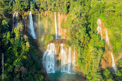 Aerial view. Thi Lo Su Waterfall in the middle of beautiful forest and mountains, Tak Province, Thailand photo
