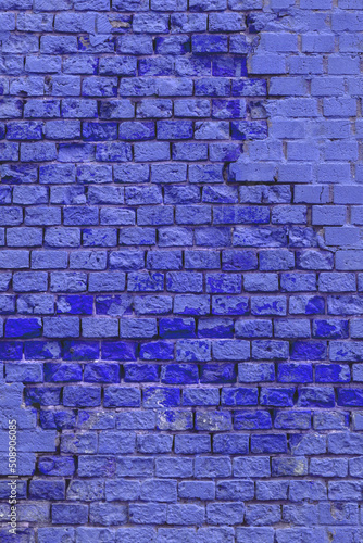 Brick wall of the building. Designer building background.