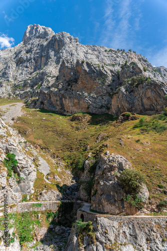 mountain scenery with a curving path on the Cares hiking route in Asturias