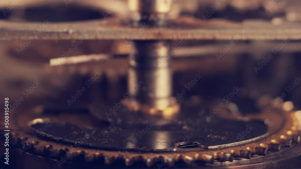 brass mechanism of old mechanical rusty clock. the gear wheel of the transmission mechanism of the clock moves. 4k. brass mechanism of old mechanical rusty clock. the gear wheel of the transmission mechanism of the clock moves. 4k.
