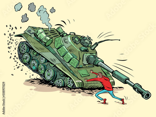 The man stops the tank. Peaceful citizens against military aggression and dictatorship. Protest