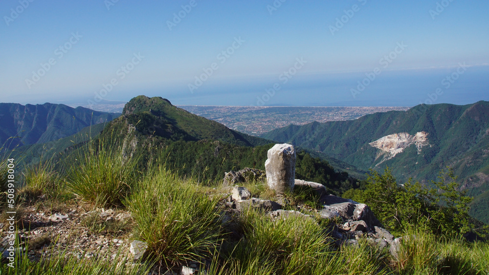 mountain landscape in the mountains with close up of a piro in white marblo