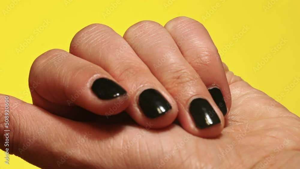 Small toy house in the female palm. Real estate concept.