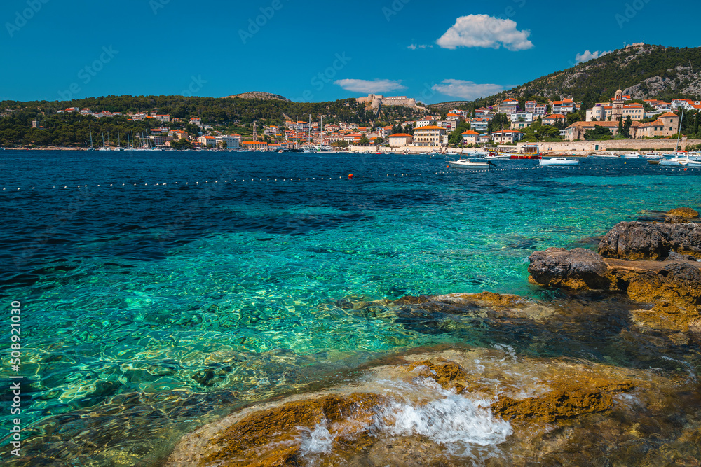 Amazing beach and rocky waterfront in Hvar, Dalmatia, Croatia Amazing beach and rocky waterfront in Hvar, Dalmatia, Croatia