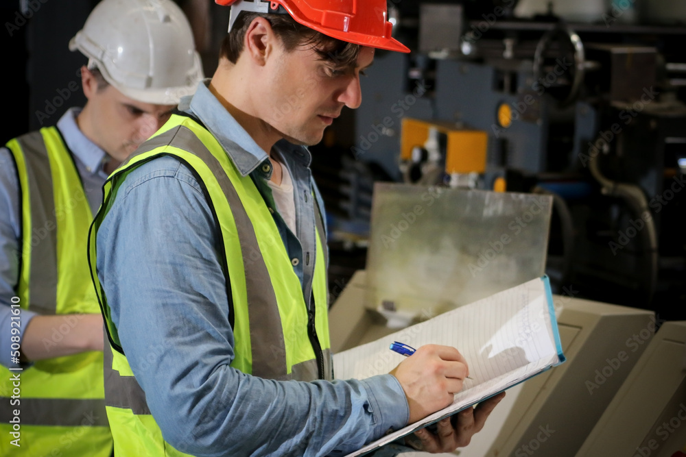 The engineer working and checking in production line in factory, technician or workers operate the machine in industry The engineer working and checking in production line in factory, technician or workers operate the machine in industry