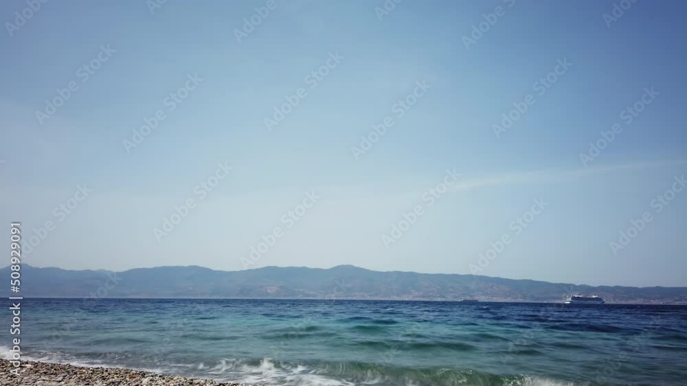 Strict of Messina with cruise ship from Reggio Calabria Seafront. Strict of Messina with cruise ship from Reggio Calabria Seafront.