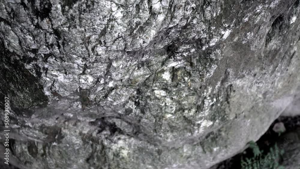 Close up on the texture of the stone in the park.