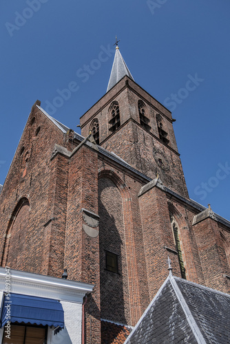 St. George’s Church (Sint Joriskerk, 1200 - 1375-1450) at the Garden square (De hof) in the medieval center of the Dutch historic city of Amersfoort. the Netherlands. photo