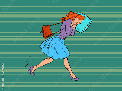 A tired businesswoman sleeps on the move. Goes to work in the morning with his head on a pillow