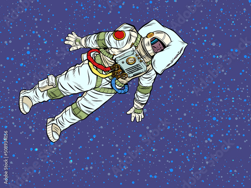 A tired astronaut sleeps in outer space. A professional sleeps at work with his head on a pillow
