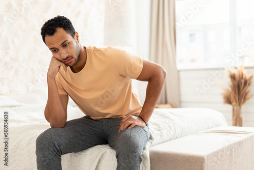 Arabic Man Thinking About Problems Suffering From Depression At Home