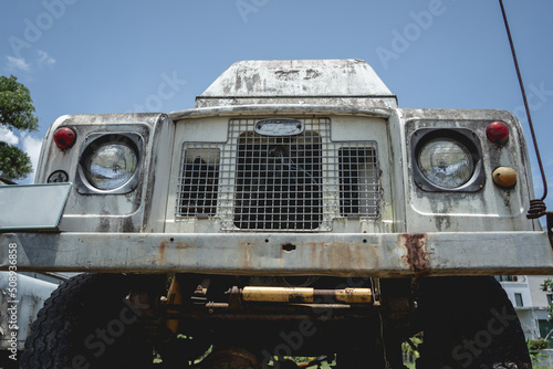Old rusty cars for safari in the jungle of Africa