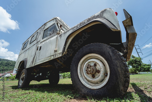 Old rusty cars for safari in the jungle of Africa