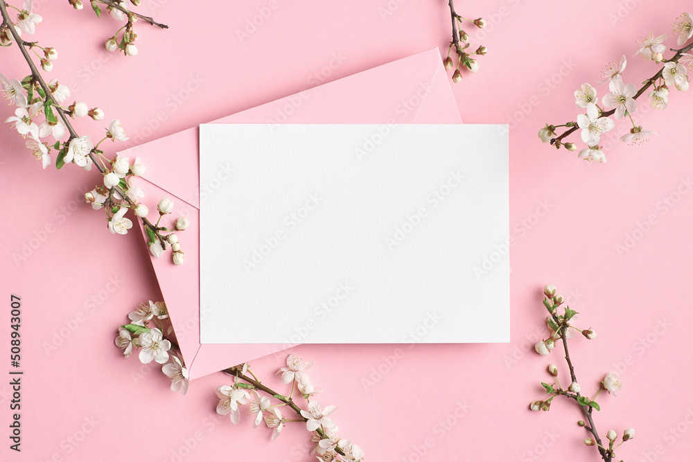 Blank invitation card mockup with envelope and flowers Blank invitation card mockup with envelope and flowers