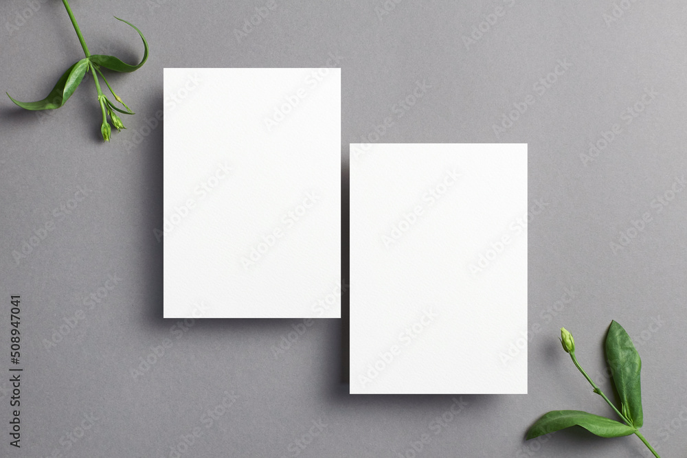 Blank invitation card mockup with front and back sides and botanical decorations