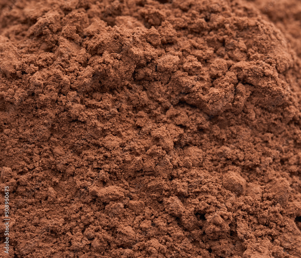 Pile of Cocoa powder isolated on white background. Pile of Cocoa powder isolated on white background.