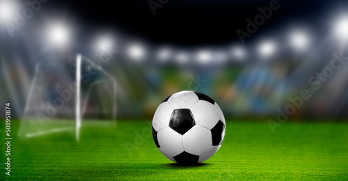 Soccer Fußball im Fußballstadion im Scheinwerferlicht © by-studio