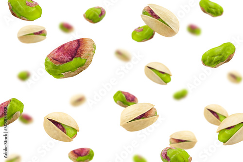 Falling pistachio isolated on white background, selective focus photo