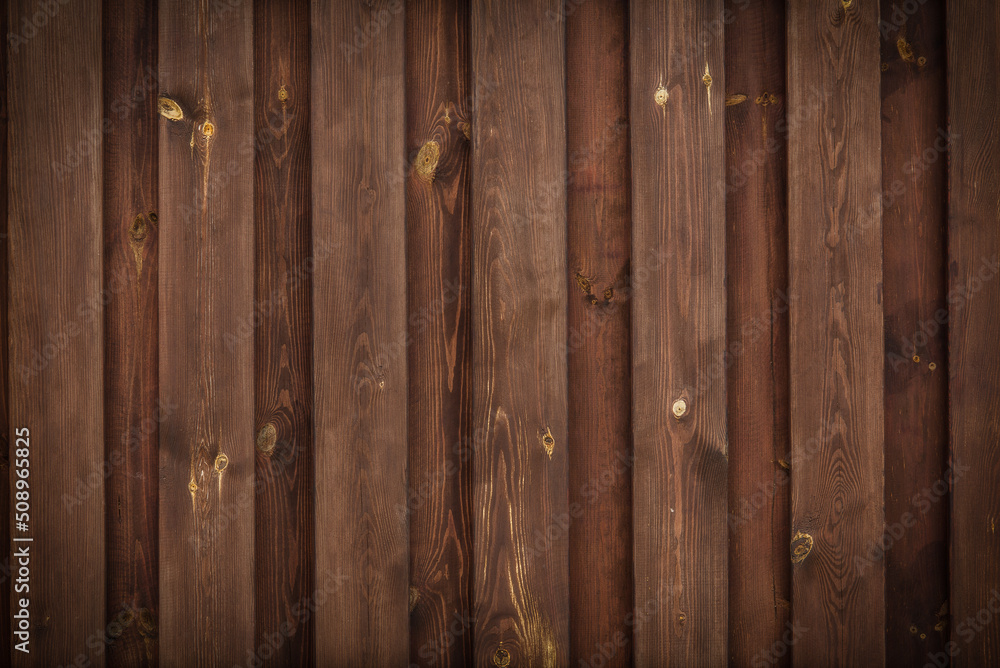 Brown wooden fence.
Texture boards in the form of a rural fence. Brown wooden fence.
Texture boards in the form of a rural fence.