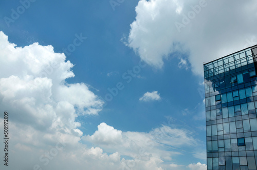 city skyline with clouds and windows
