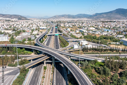 Attiki Odos toll road interchange and National highway in Attica, Athens, Greece. Aerial drone view photo