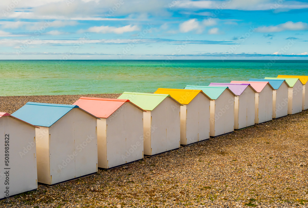 Row of pastel colored bathing huts at Le Treport beach, Normandy, France
Row of pastel colored bathing huts at Le Treport beach, Normandy, France