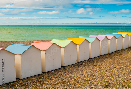 Row of pastel colored bathing huts at Le Treport beach, Normandy, France
 photo