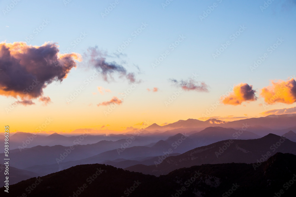 Obraz premium Sunset in Mare De Deu Del Mont peak, La Garrotxa, Spain
