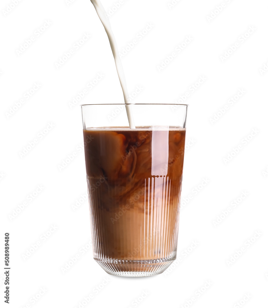 Pouring of milk into glass with iced coffee on white background Pouring of milk into glass with iced coffee on white background