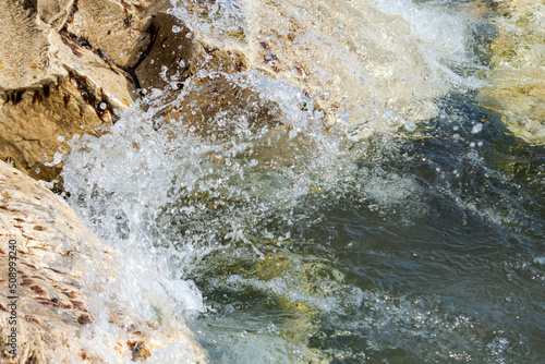 Wallpaper Mural A wave crashes into the break wall at Coral Dock Park in Port Washington, Wisconsin. Torontodigital.ca