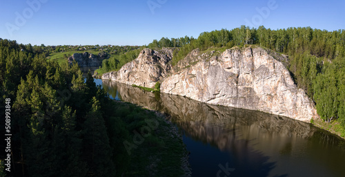 Ural river Iset, with a rocky forest shore, Russia