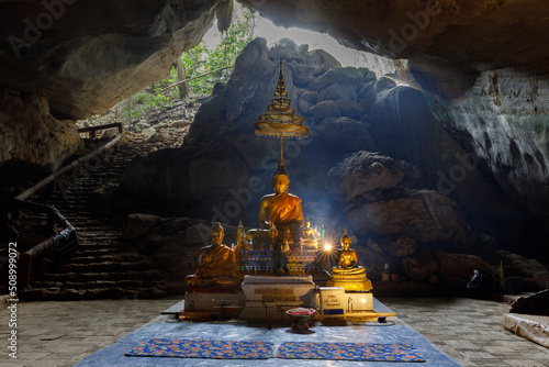 Photography Golden buddha At the end of the walk of Pha Nang Khoi Cave Rong Kwang District,
