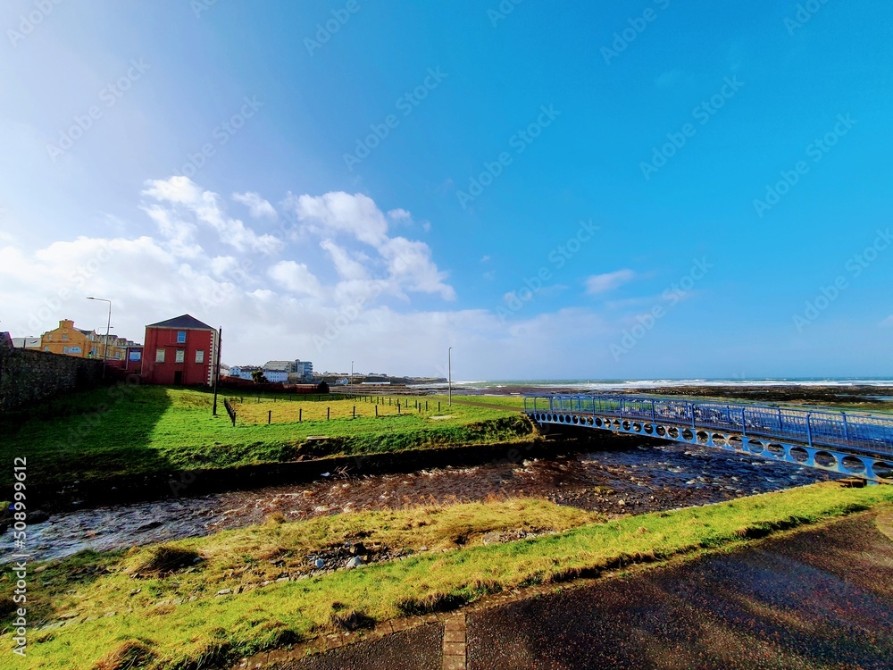 landscape with a bridge, a red house, a river and a beach landscape with a bridge, a red house, a river and a beach