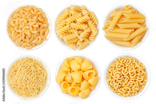 Different types of pasta in a white cup on a white background. View from above