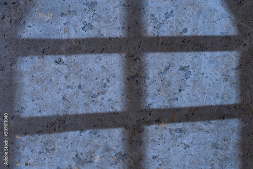 Shadow from a barred window...