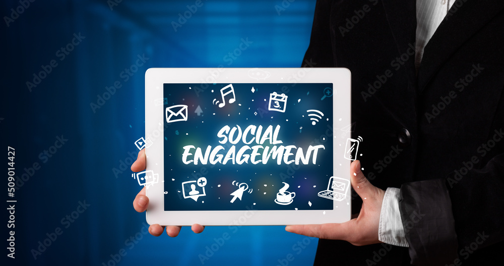 Person holding tablet, social network concept Person holding tablet, social network concept