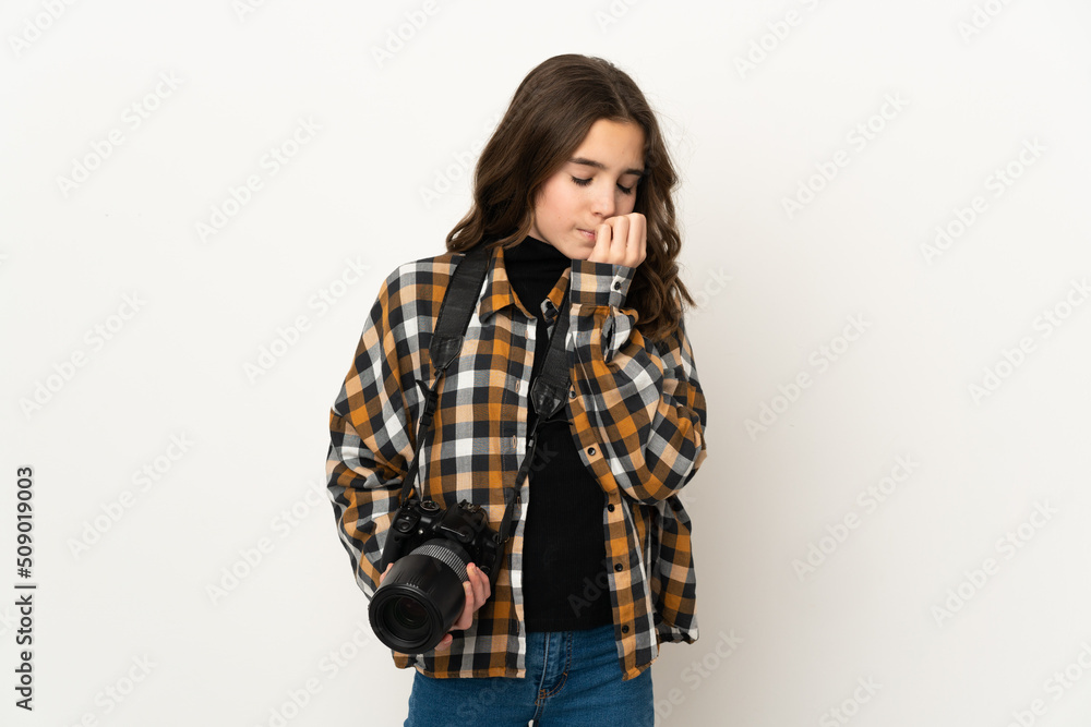Little photographer girl isolated on background having doubts Little photographer girl isolated on background having doubts