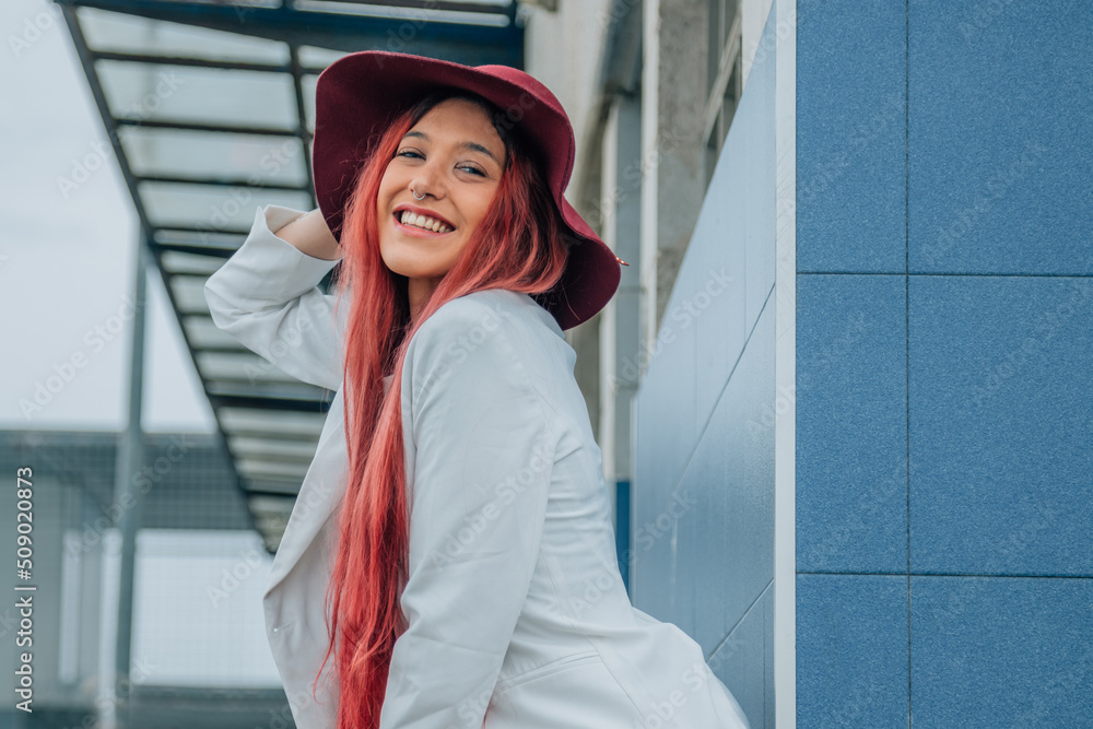 redhead hipster with hat on the street wall redhead hipster with hat on the street wall