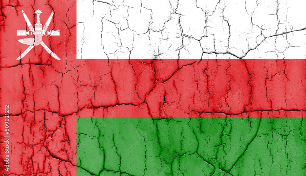 Textured photo of the flag of Oman with cracks.